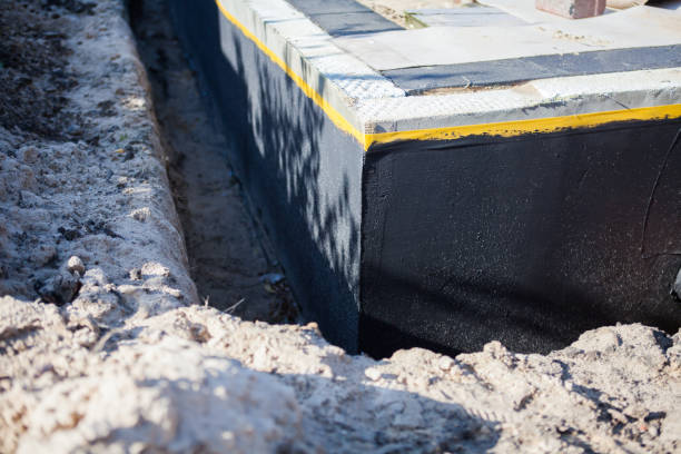 Professional Waterproofing technician working in Hampstead, MD